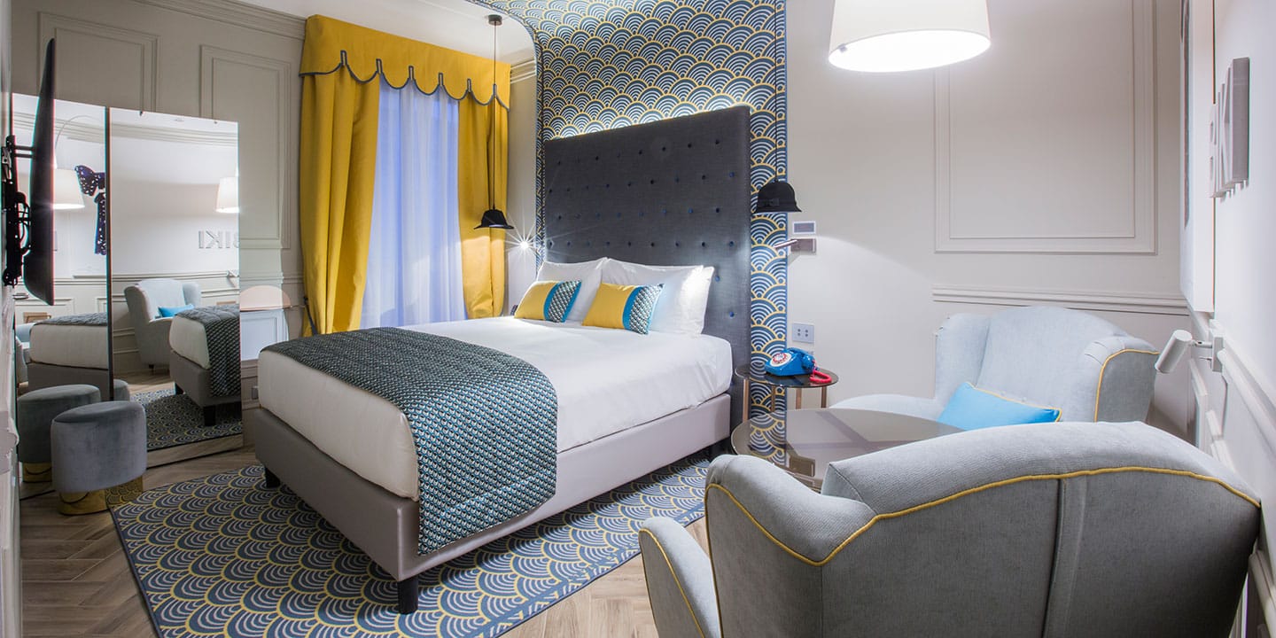 liuni_hotel_indigo_monforte_tessuti_runner_tendaggi_tappetto_cuscino_baldacchino