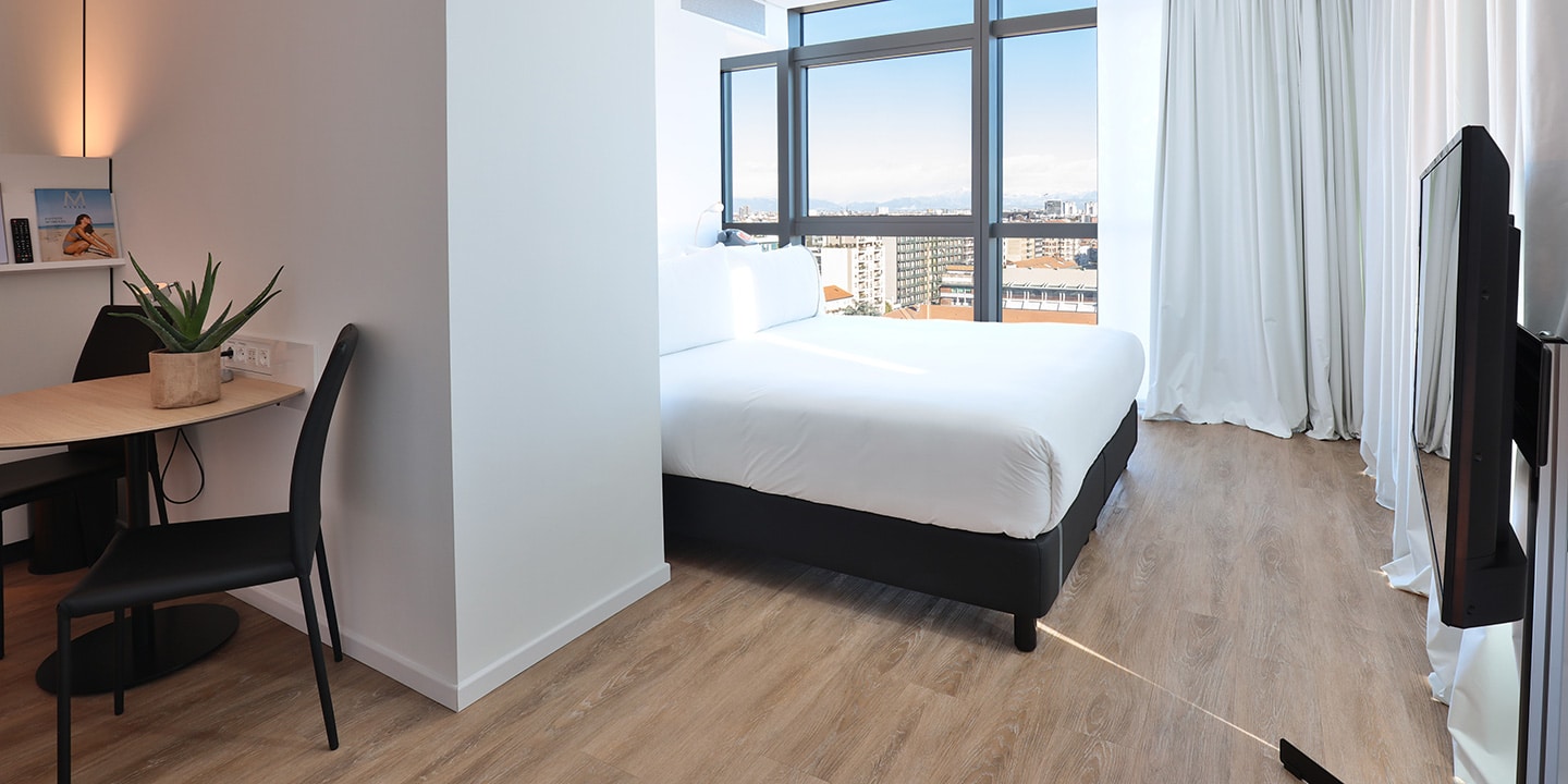 liuni_pavimento_lvt_effetto_legno_expona_simplay_camera_hotel_melia_innside_torre_galfa